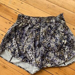 Lululemon track that 5” shorts 
Floral Metropolis